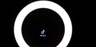 How to Download TikTok on Your iPhone Following the U.S. Ban: A Survival Guide for the Chronically Online white and black round light